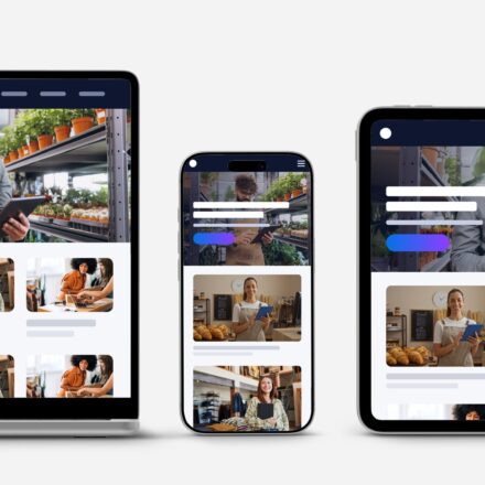 The same web page on a laptop, a phone and a tablet, its layout changing from three columns to two to one.